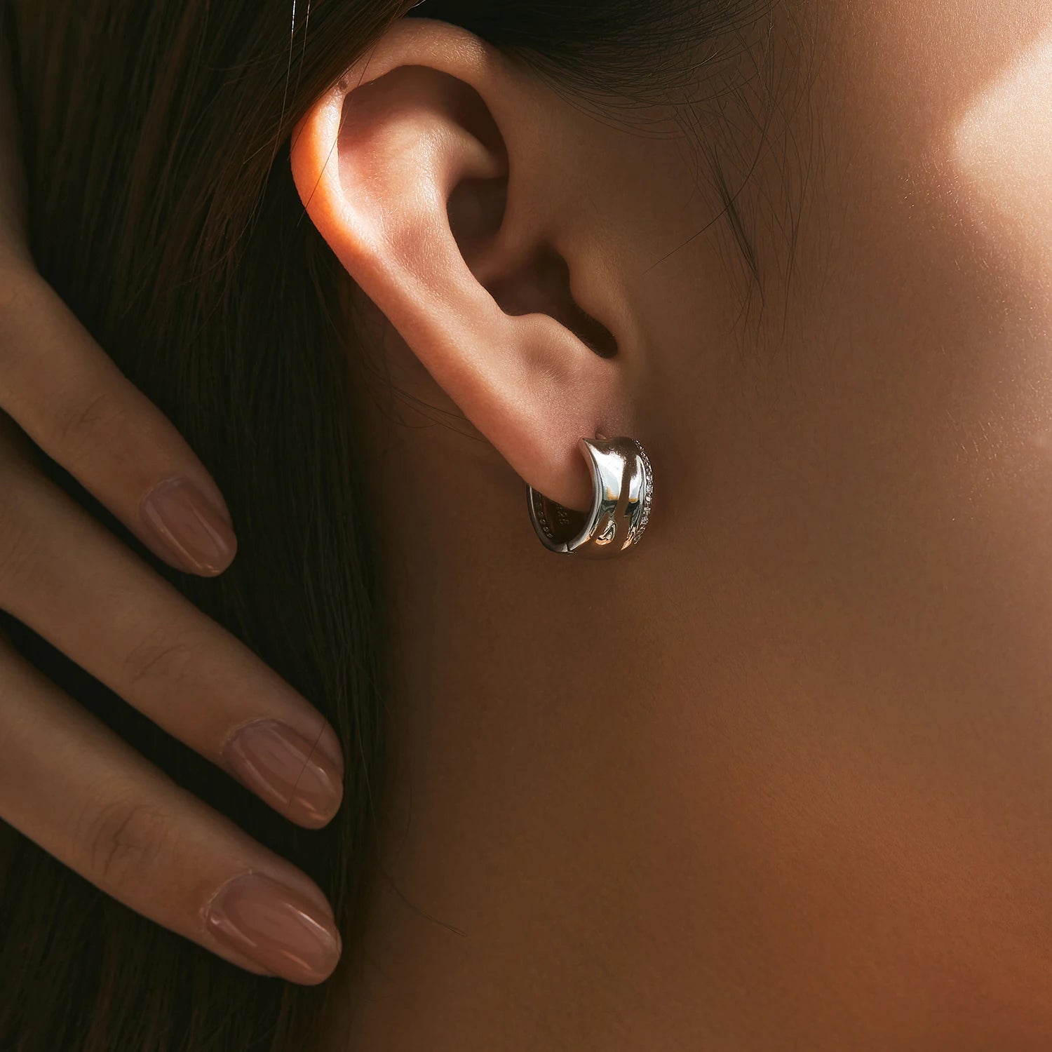 עגילי טוויסט זירקון